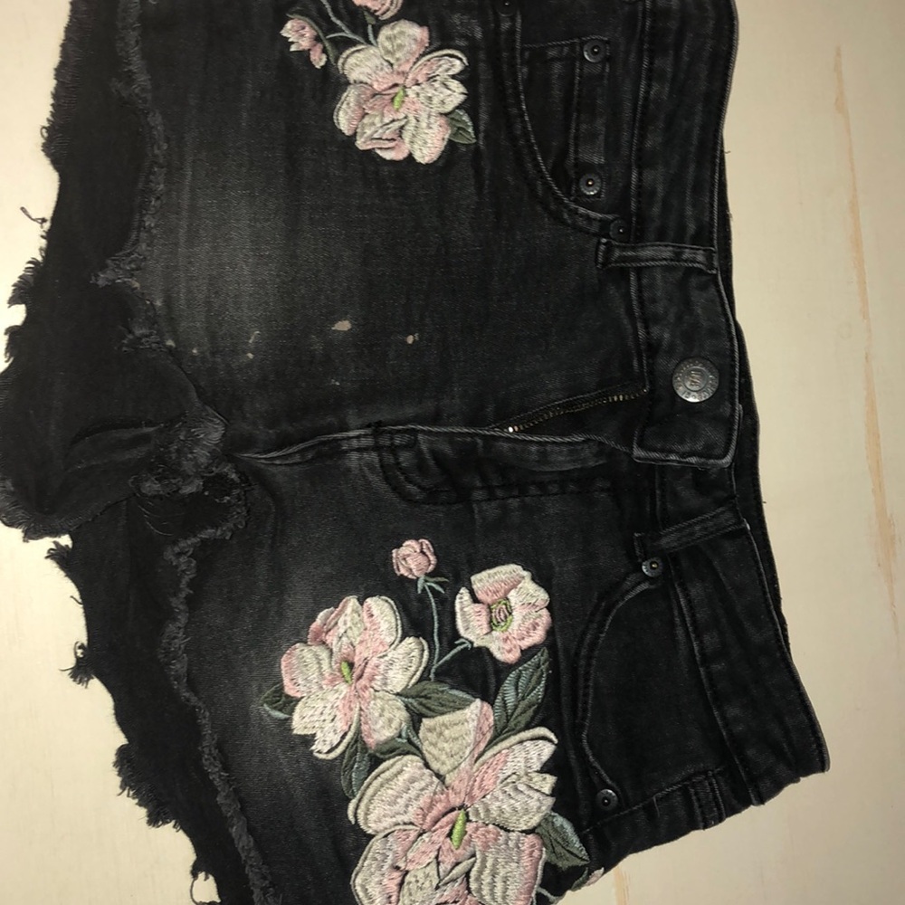 Black Aeropostale flowered jean shorts